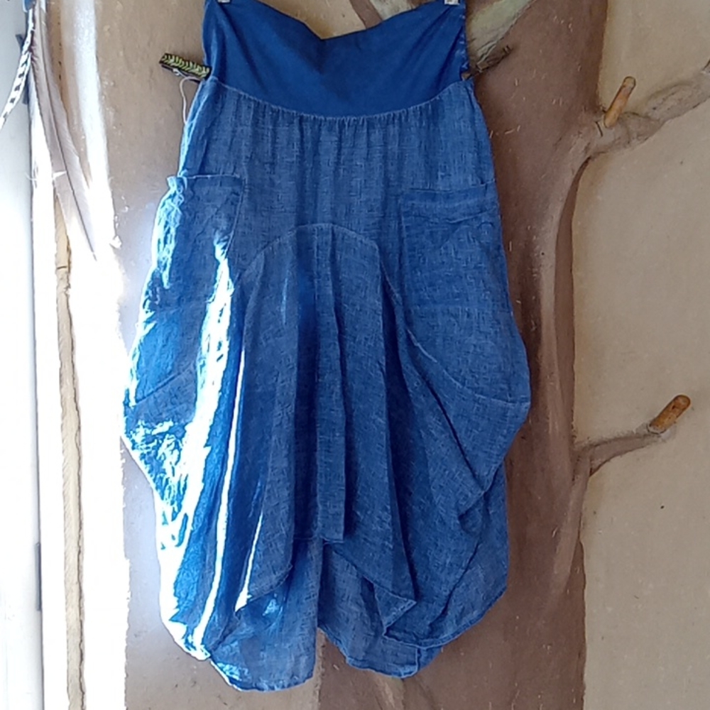 Blue linen skirt, swing seams, inizio